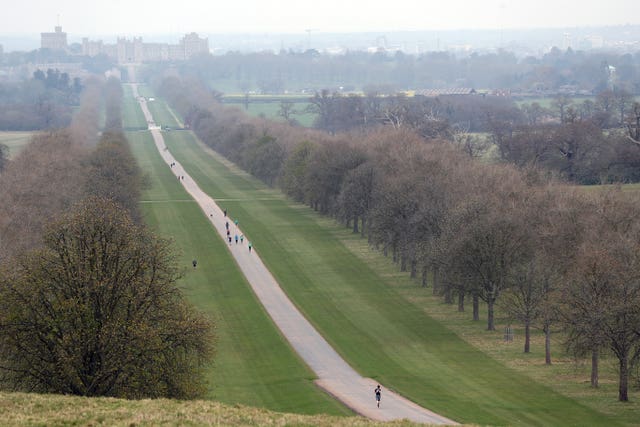 General view of Windsor Castle as seen down the Long Walk in Windsor Great Park