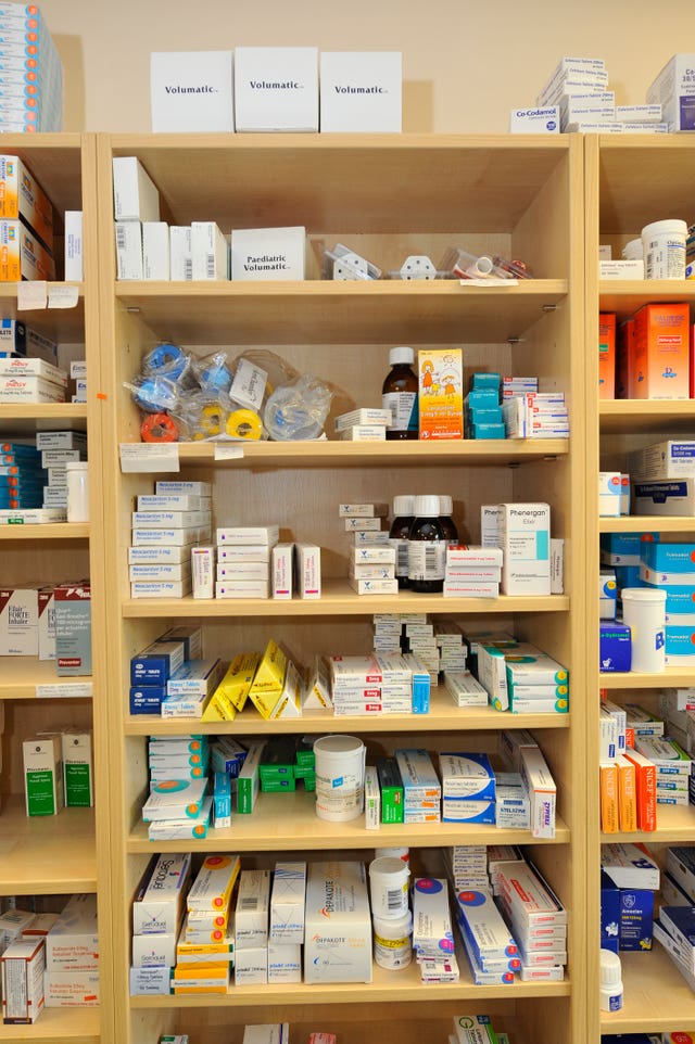 Medicines and drugs on a shelf in a pharmacy (Ben Birchall/PA)