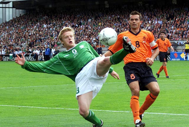 Cocu (right) won 101 caps for Holland, and reached the World Cup semi-finals