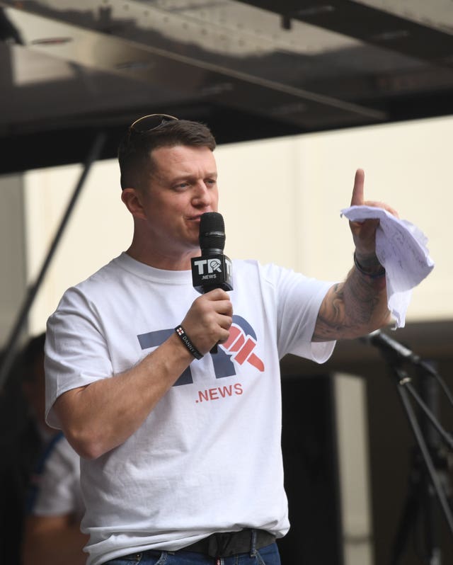 Former English Defence League leader Tommy Robinson rallies the crowd in Whitehall 