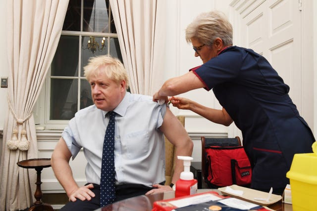 First things first - Boris Johnson received a flu jab at Downing Street before heading to Parliament 
