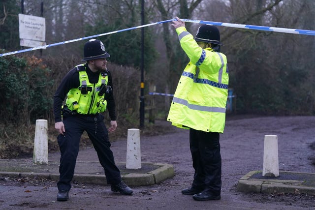 Police officers at the scene near Scribers Lane in the Hall Green area of Birmingham