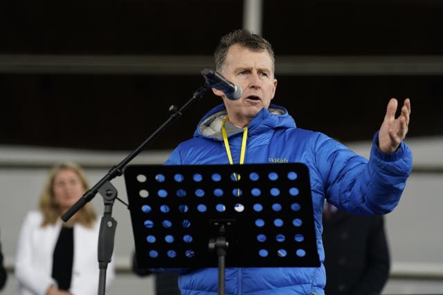Former rugby union referee Nigel Owens addresses protesters in front of the Senedd during a protest by thousands of farmers (Andrew Matthews/PA)