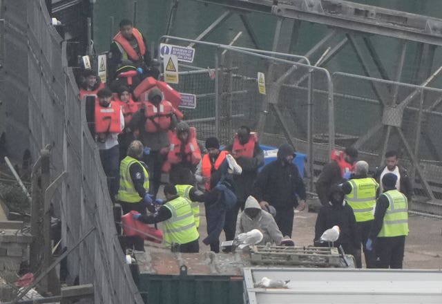 A group of people thought to be migrants are brought in to Dover, Kent, from a Border Force vessel