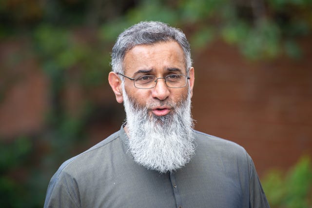 Anjem Choudary walks outside court