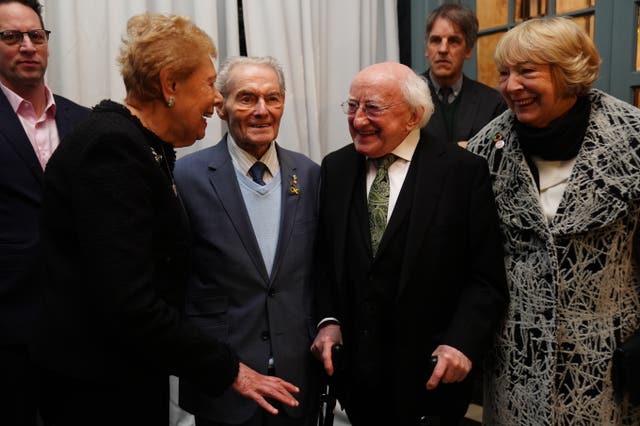 Michael D Higgins and his wife Sabina with Holocaust survivors Suzi Diamond (left) and Tomi Reichenthal