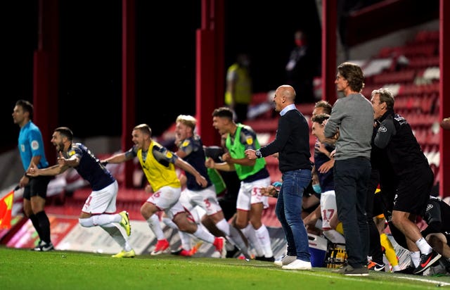 Barnsley manager Gerhard Struber and his players celebrate survival