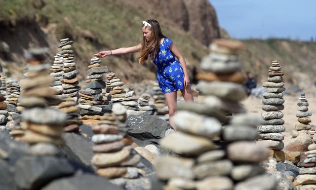 Pebble sculptures in Whitley Bay beach on the North East coast, while people are taking their daily lockdown exercise they have kept adding pebble sculptures transforming the beach as the UK continues in lockdown to help curb the spread of the coronavirus