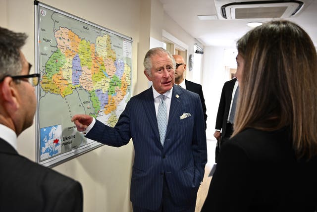 The Prince of Wales, in his role as Patron of World Jewish Relief, is shown a map of Ukraine