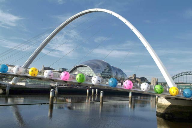 The Gateshead Millennium Bridge, dressed with giant Lottery balls (National Lottery/PA)