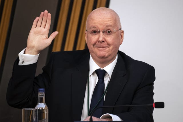 Peter Murrell taking an oath before the Salmond inquiry