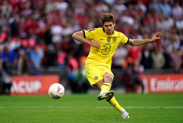 Chelsea's Marcos Alonso scores in the penalty shootout during the Emirates FA Cup Final at Wembley Stadium, London