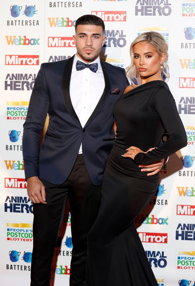 Tommy Fury and Molly-Mae Hague pose on the red carpet