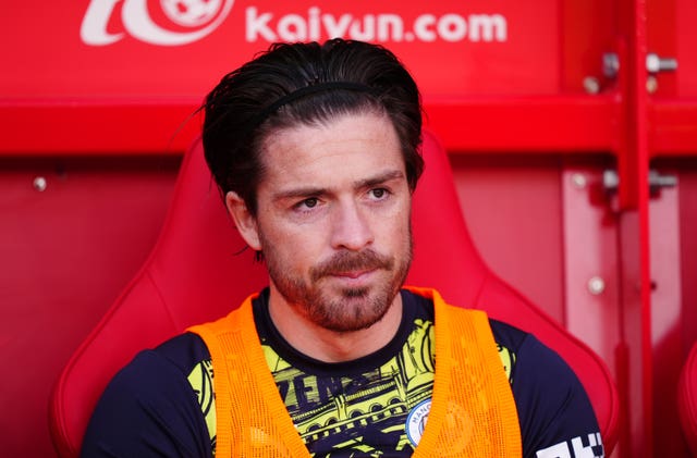 Jack Grealish sits on the bench for Manchester City against Nottingham Forest