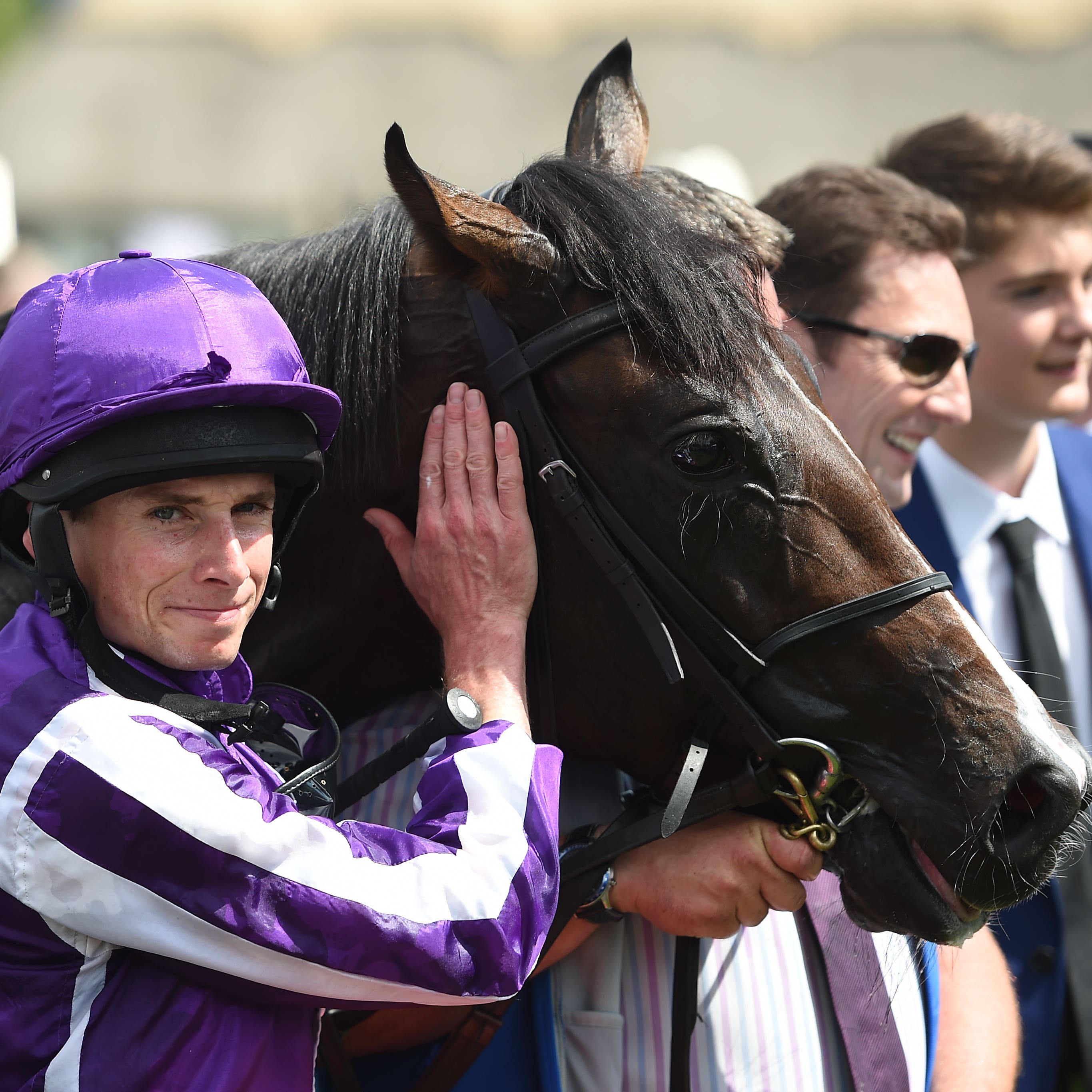 Ryan Moore with US Navy Flag after winning the Darley July Cup