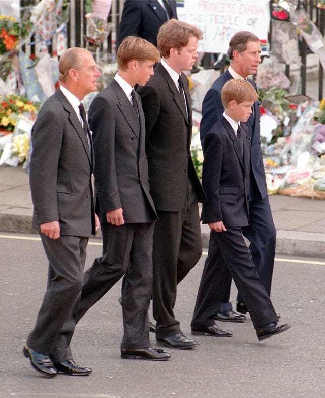 The Duke of Edinburgh,  William, Earl Spencer,  Harry and the Prince of Wales following the coffin of Diana, Princess of Wales, to Westminster Abbey for her funeral service in 1997 (Adam Butler/PA)