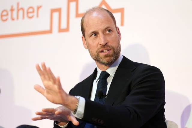 Prince of Wales speaks, his hand outstretched