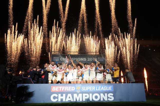 St Helens lift the Super League trophy after beating Salford in the Grand Final at Old Trafford 