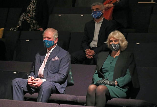 The Prince of Wales and Duchess of Cornwall with Mayor of London, Sadiq Khan (rear, centre), watch a short rehearsal performance, during a visit to the Soho Theatre in London. Chris Jackson/PA Wire