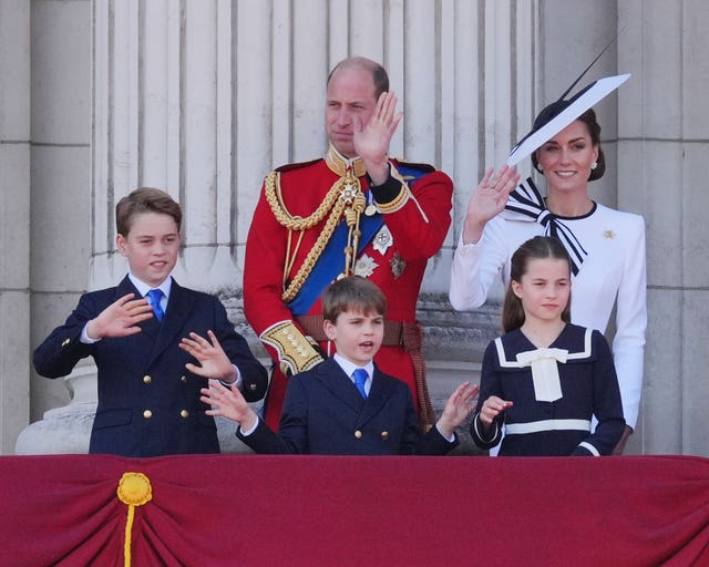 Prince George, the Prince of Wales, Prince Louis, the Princess of Wales and Princess Charlotte on the balcony of Buckingham Palace