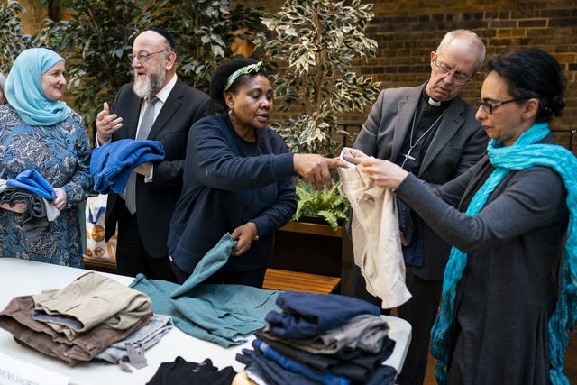 Faith leaders sort clothes
