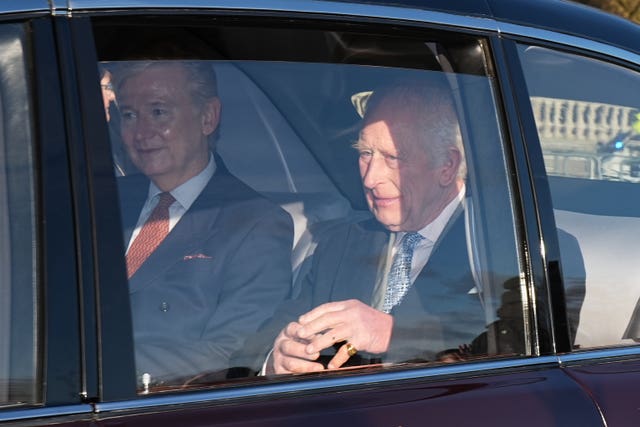 King Charles and his private secretary Sir Clive Alderton arriving for the King’s Christmas lunch at Buckingham Palace, London. 