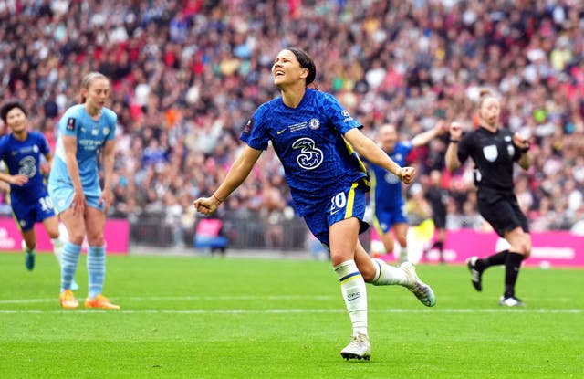 Kerr celebrates her second goal, an extra-time winner, in the final against City (John Walton/PA)