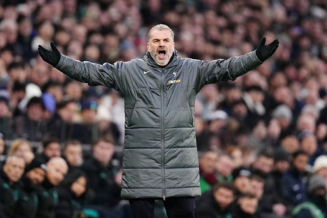 Ange Postecoglou raises his arms