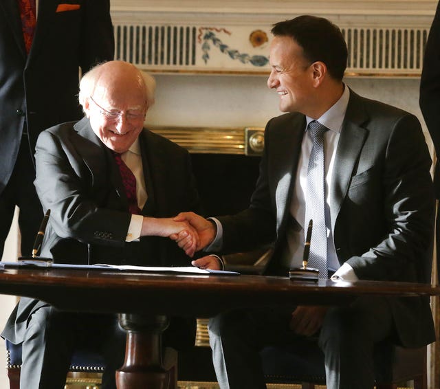 Then taoiseach Leo Varadkar shakes hands with President of Ireland, Michael D Higgins following Mr Varadkar's request in January to dissolve the 32nd Dail at Aras an Uachtarain (Damien Eagers/PA)