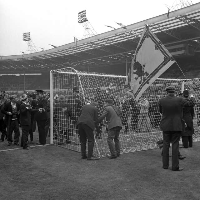 Scotland fans celebrated on the pitch 