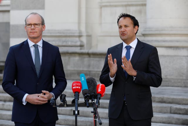 Leo Varadkar speaks alongside Simon Coveney at Government Buildings 