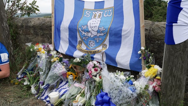 Tributes at the scene of the collision