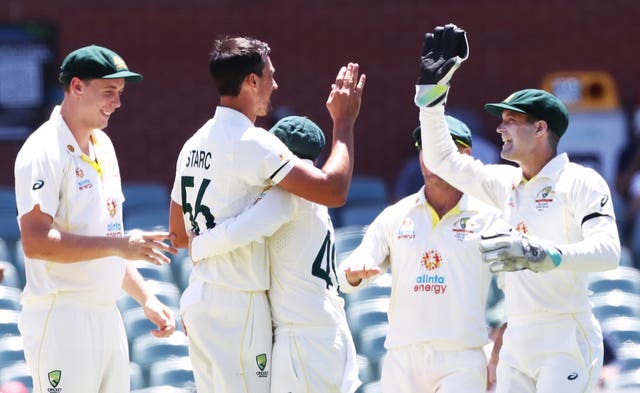 Australia’s Mitchell Starc celebrates taking the wicket of England’s Ollie Pope