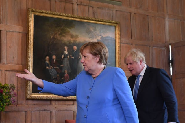 Then Prime Minister Boris Johnson hosted then German Chancellor Angela Merkel at Chequers (Stefan Rousseau/PA)