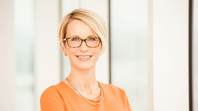 Handout photo of Emma Walmsley smiling, wearing a peach-coloured top