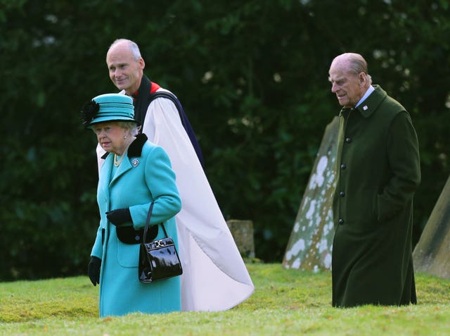 The Queen and the Duke of Edinburgh at St Peter and St Paul West Newton in Norfolk, as the Queen approached her Sapphire Jubilee