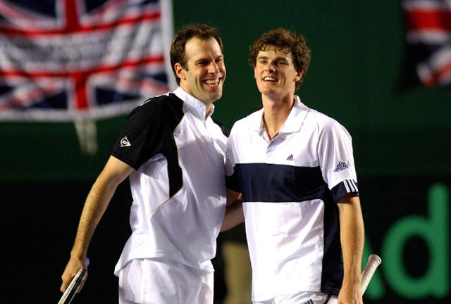 Greg Rusedski, left, and Jamie Murray celebrate after beating Holland’s Robin Haase and Rogier Wassen in Birmingham
