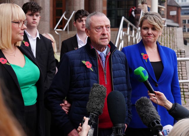 Patrick O’Hara (centre) stands with family members as he speaks to the media outside Newcastle Crown Court 