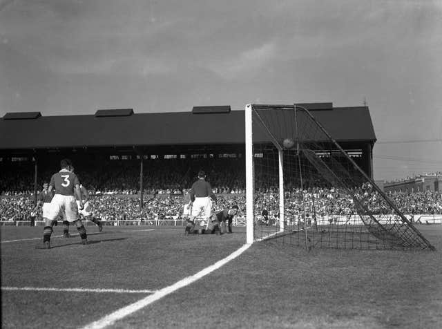 Chelsea goalkeeper Harry Medhurst looks on despairingly as centre-half John Harris deflects the ball into his own net at Stamford Bridge in Septemnber 1949