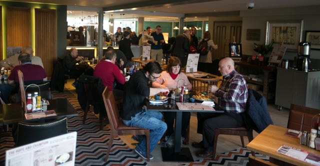 A Wetherspoons pub with diners