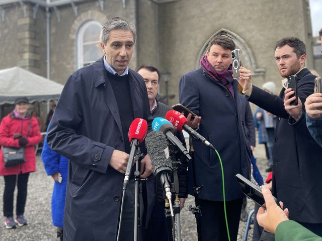 Simon Harris speaking at canvassing event
