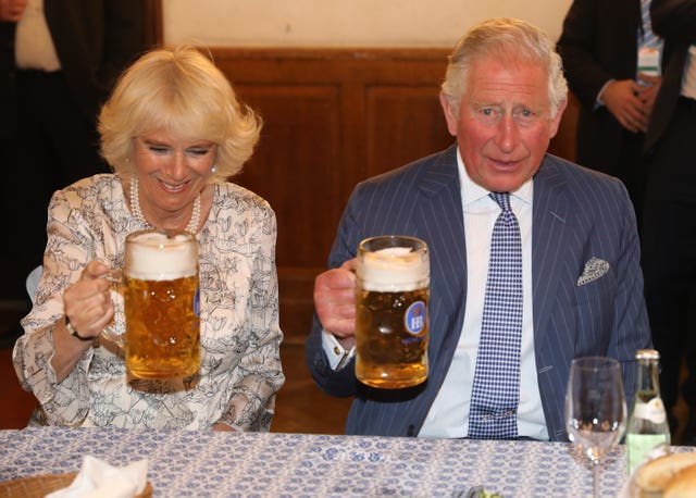 Charles and Camilla enjoying the German culture in Munich during a previous visit to the country. Steve Parsons/PA Wire