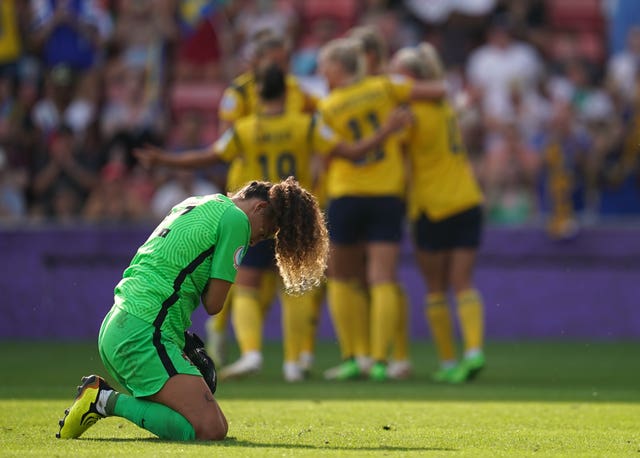 Portugal goalkeeper Patricia Morais is brought to her knees by Sweden's fourth goal in her side's 5-0 defeat