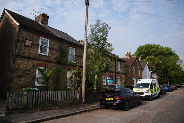 Police van outside a house