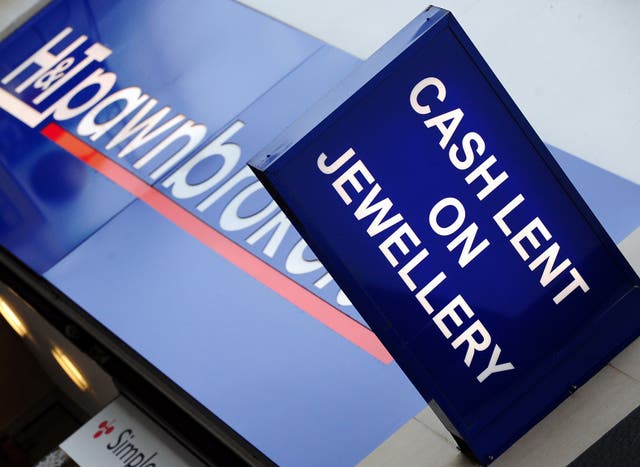 An H&T Pawnbroking sign outside one of the company's stores