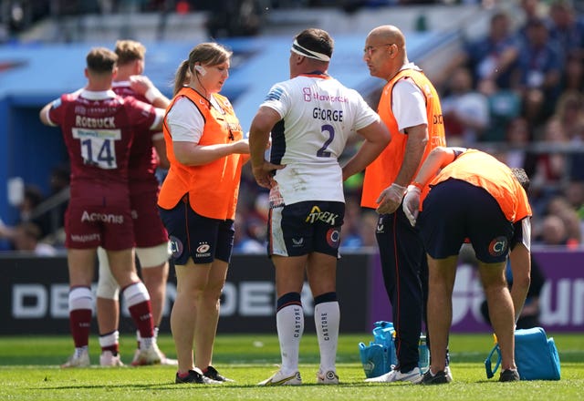 Jamie George receives medical attention