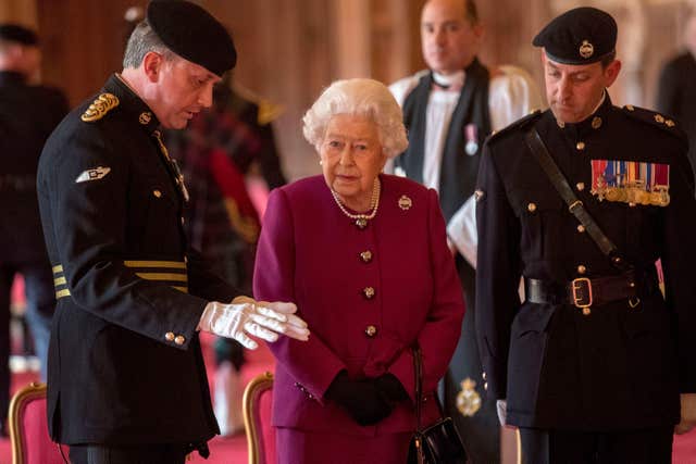 The presentation took place in St George’s Hall at Windsor Castle in Berkshire (Steve Parsons/PA)