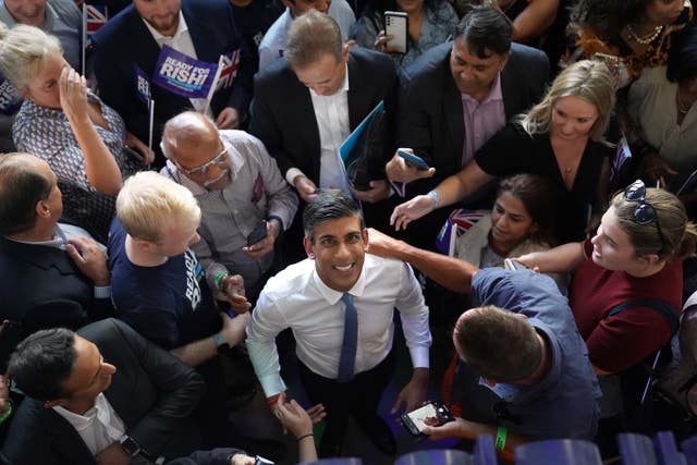 Rishi Sunak (centre) arrives for a hustings event at Wembley Arena, London, as part of the campaign to be leader of the Conservative Party and the next prime minister