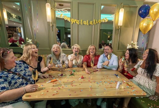 Some of the winning members of the West Is Best lottery syndicate