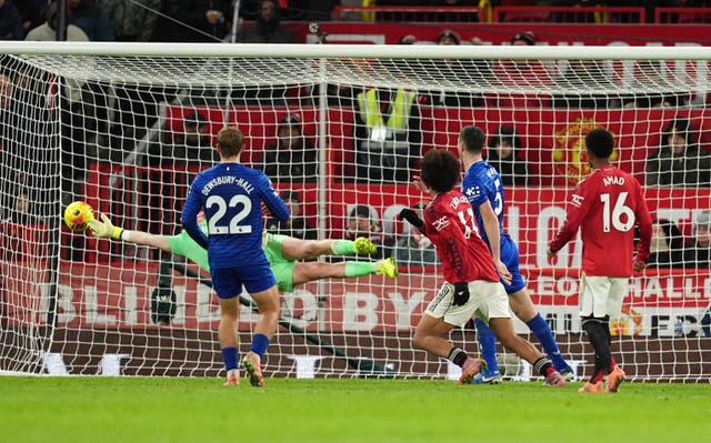 Everton goalkeeper Jordan Pickford makes a save from Manchester United’s Joshua Zirkzee 